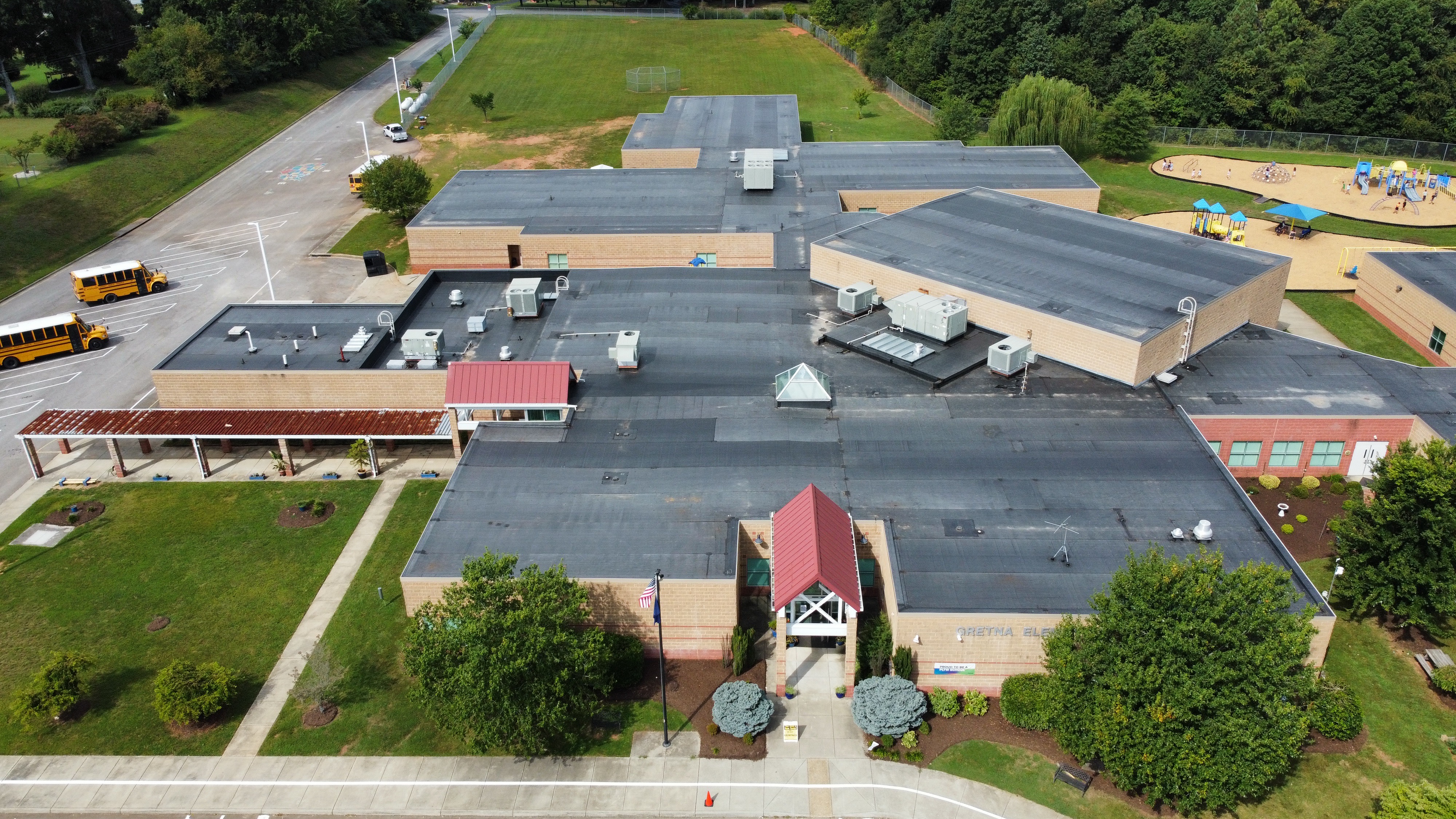 School Roofing commercial roof planning in New Orleans
